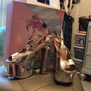 Jeffrey Campbell size 7 1/2 Silver platforms.